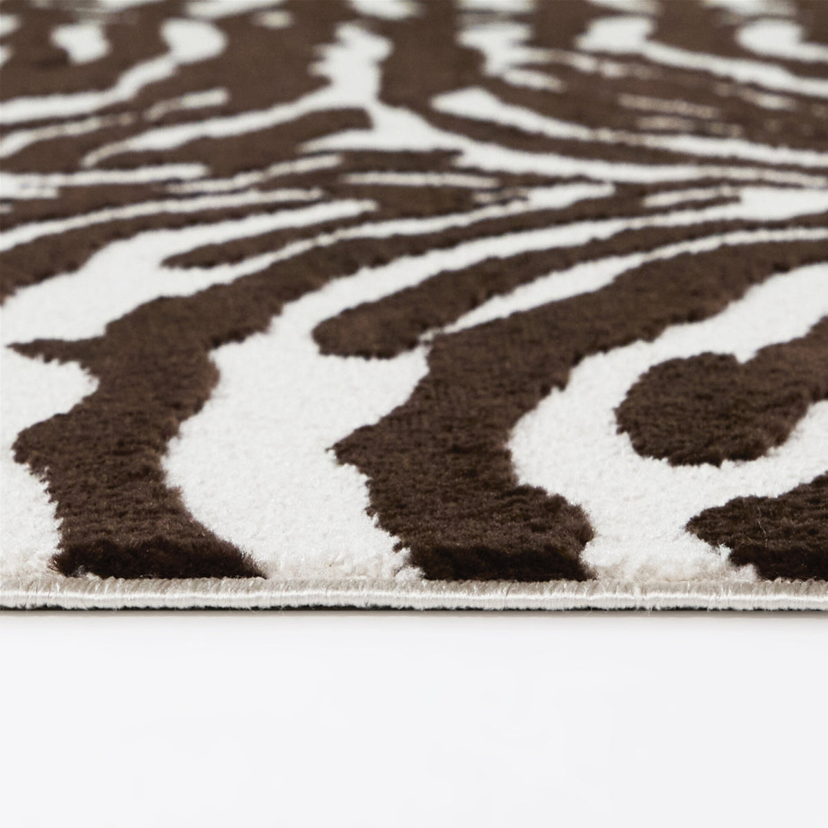 Tayali Animal Print Area Rug