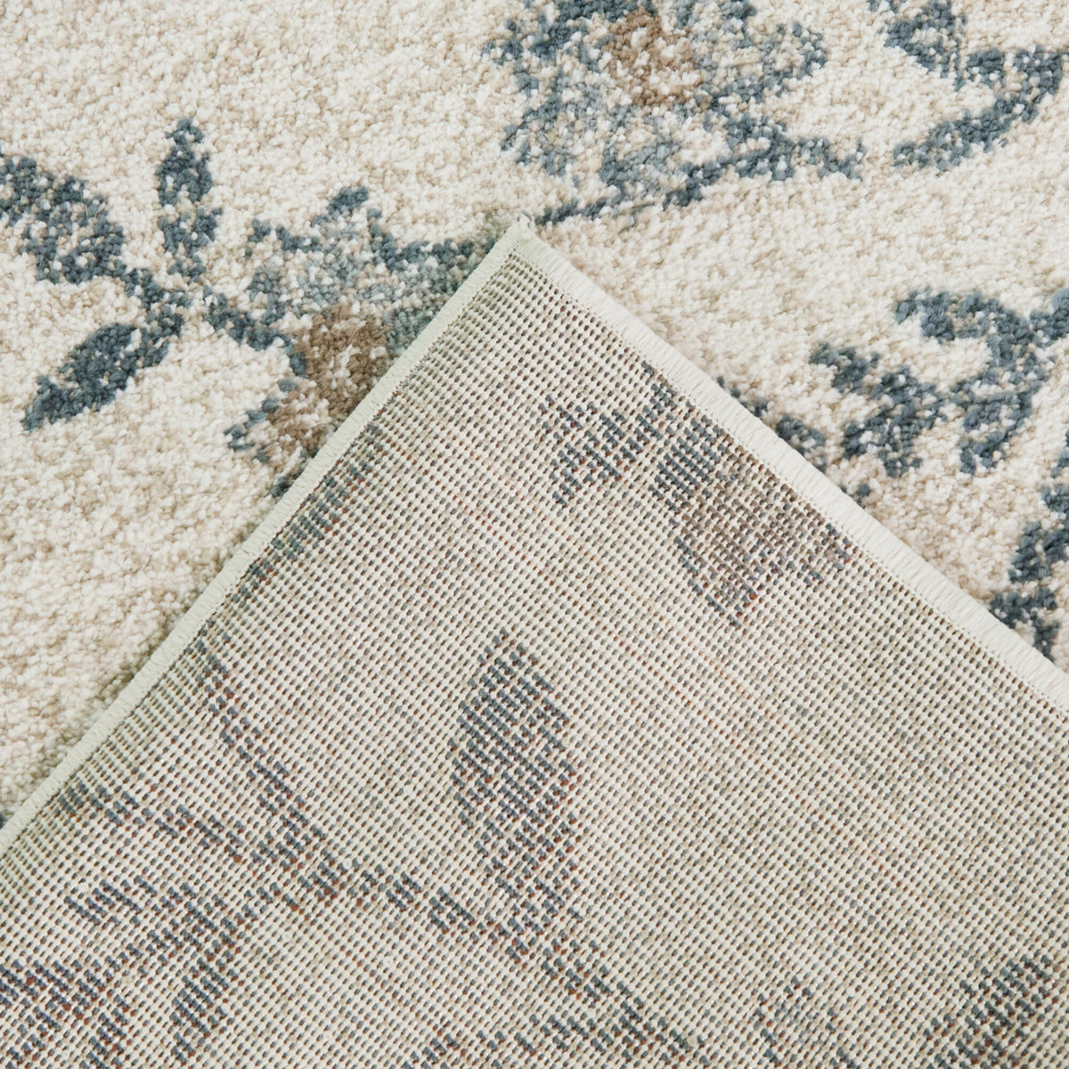 Emanuele Distressed Floral Area Rug