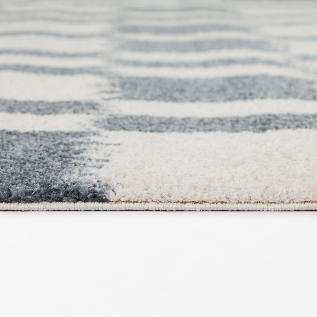 Noland Checkered Ikat Area Rug