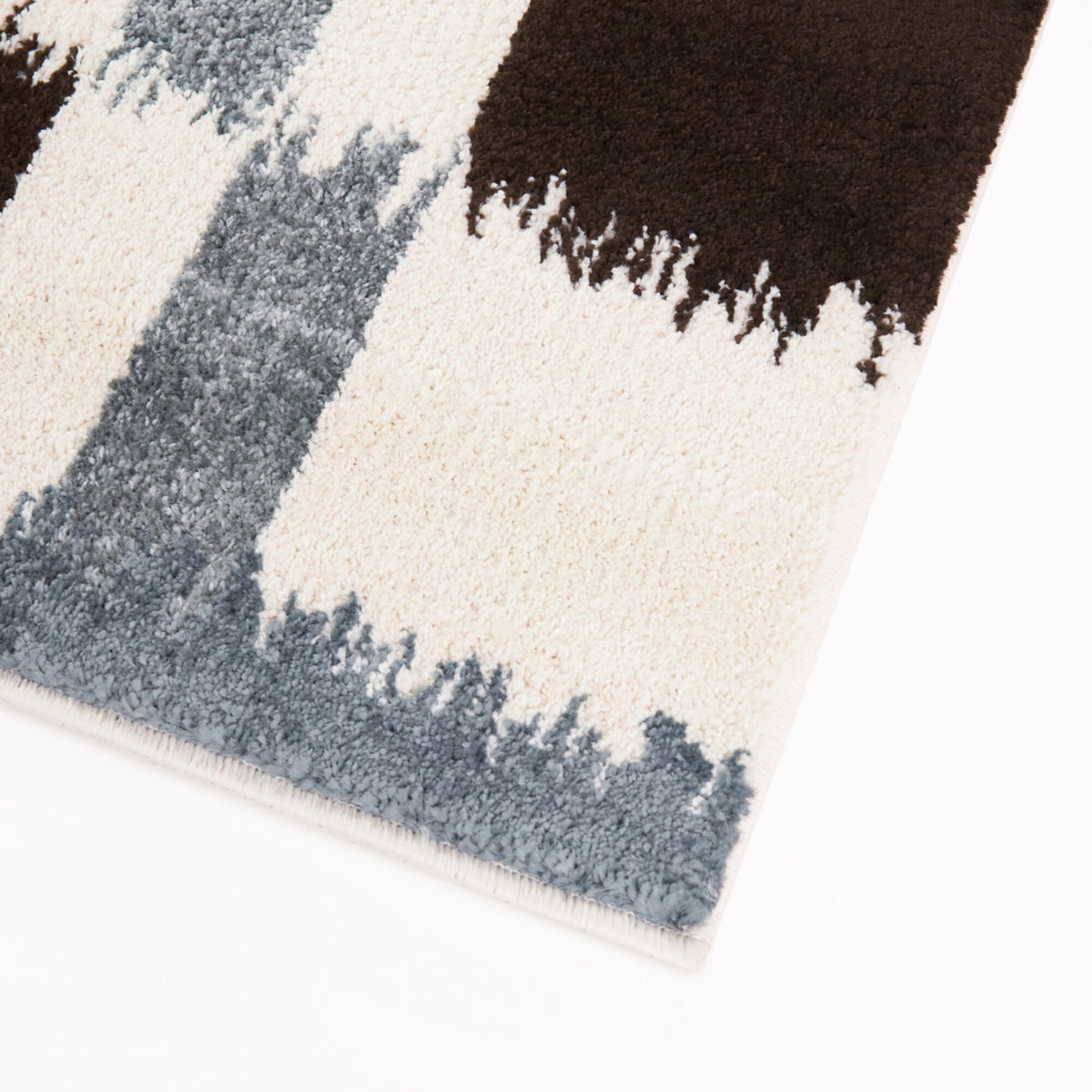 Noack Checkered Ikat Area Rug