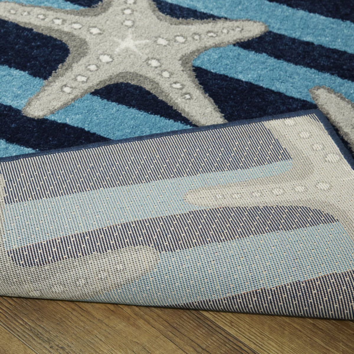 Sereia Starfish Print Striped Area Rug