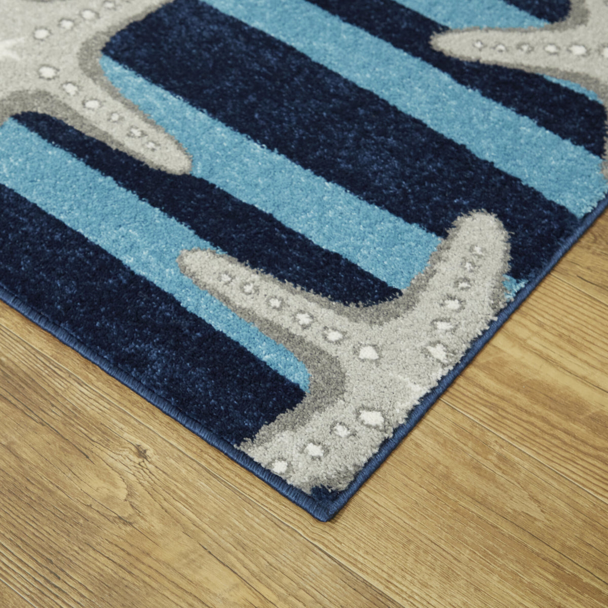 Sereia Starfish Print Striped Area Rug