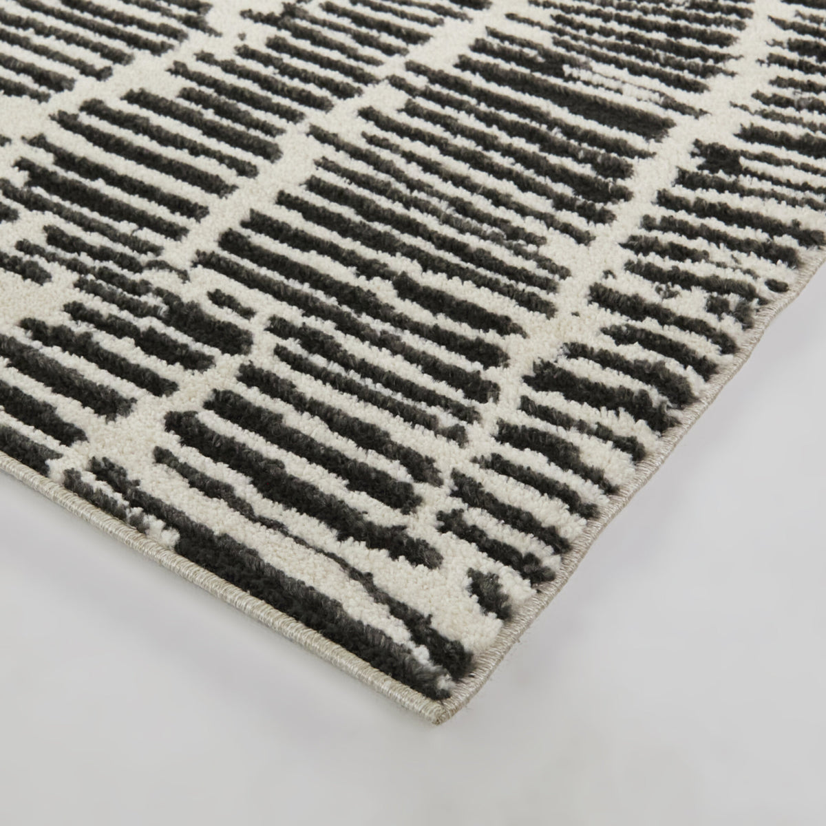 Kuzman Modern Textured Stripe Area Rug