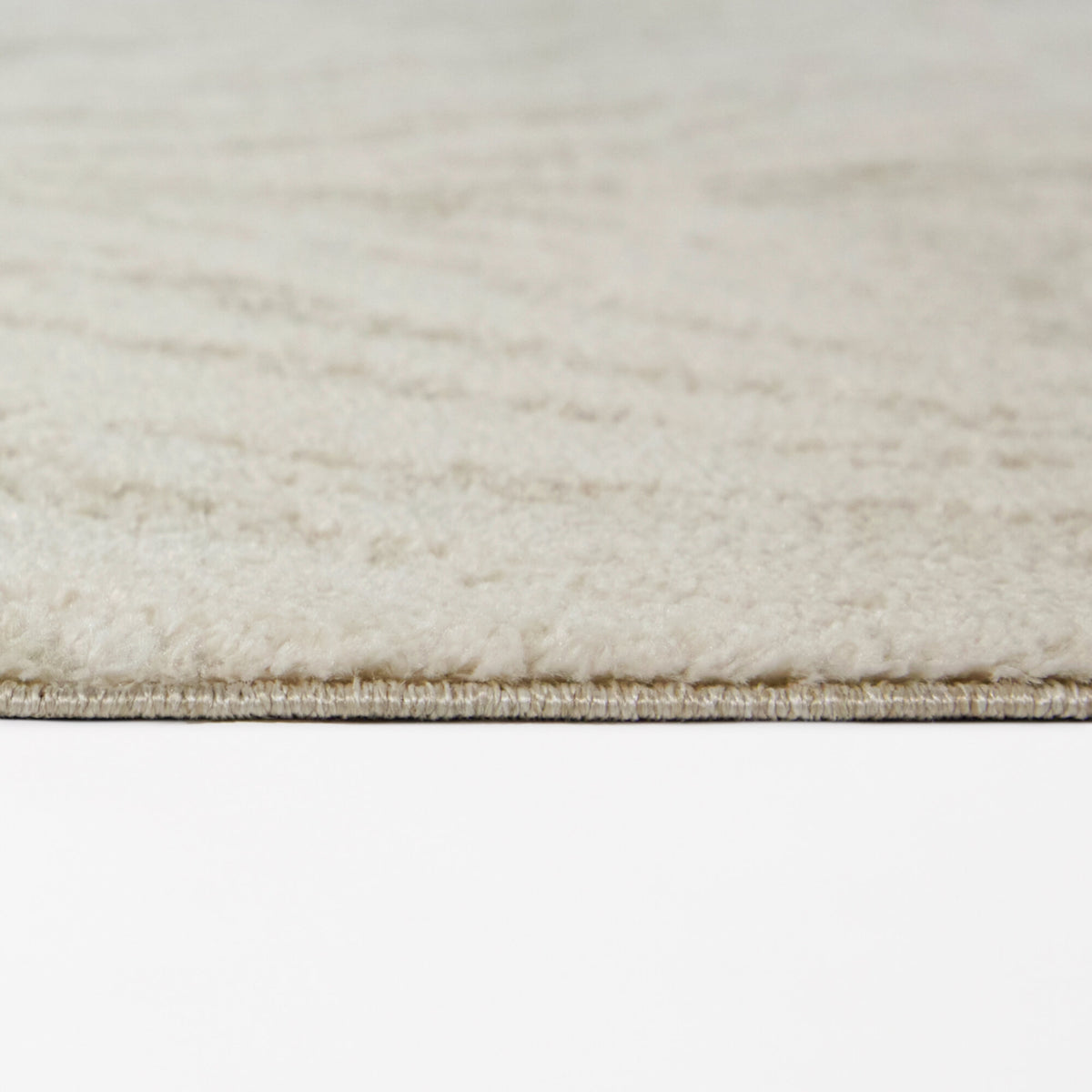 Nassos Abstract Waves Area Rug