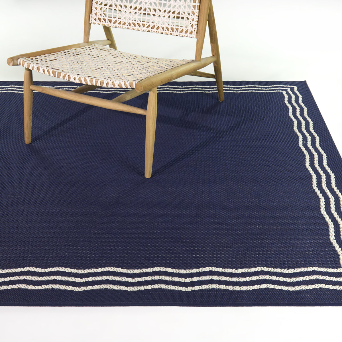 Squiggle Border Area Rug