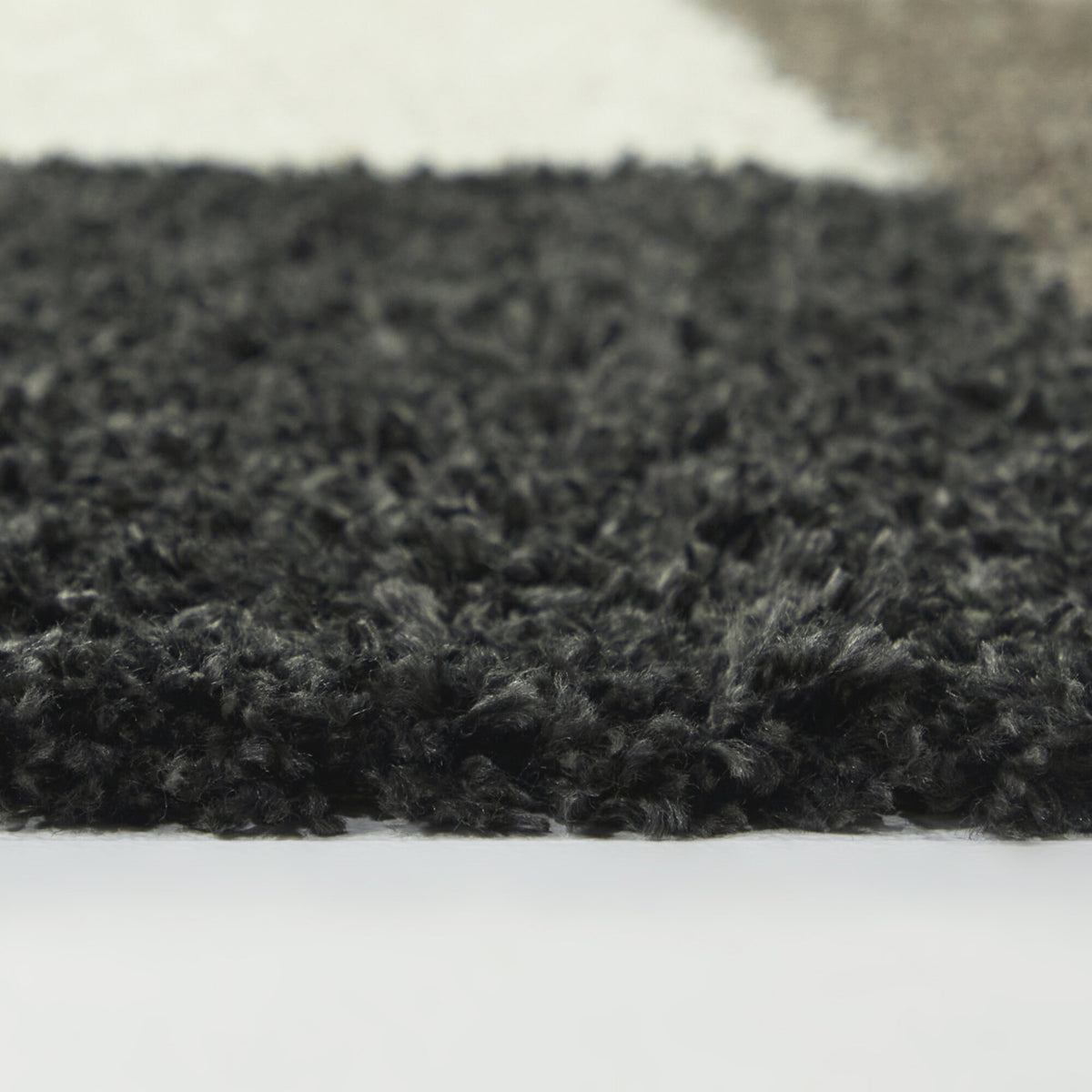 Roger Geometric Shag  Area Rug