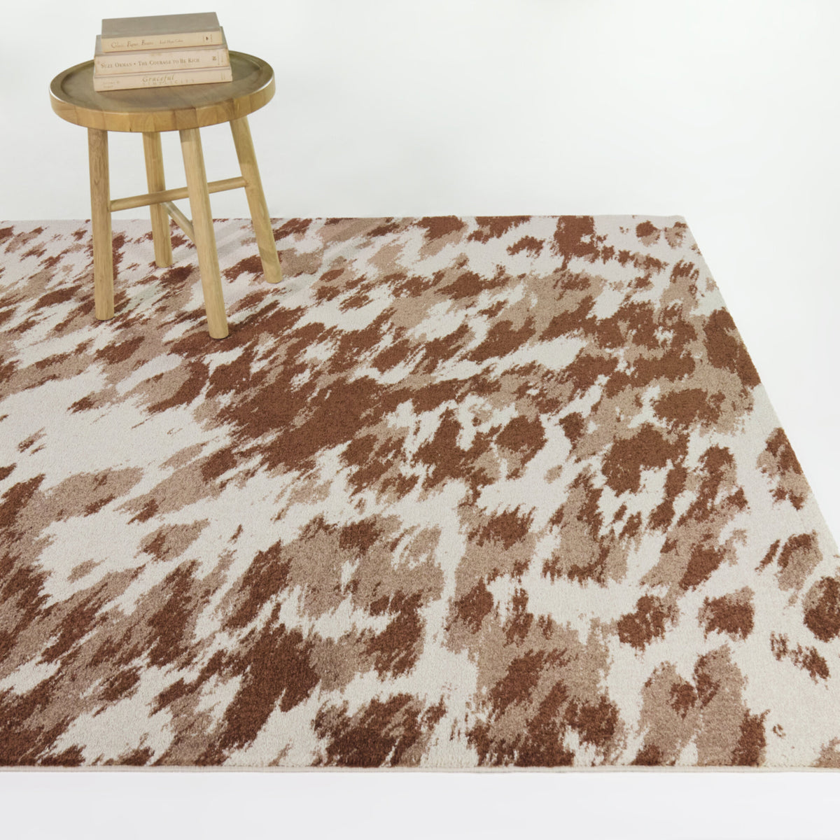 Sanchez Cow Print Area Rug