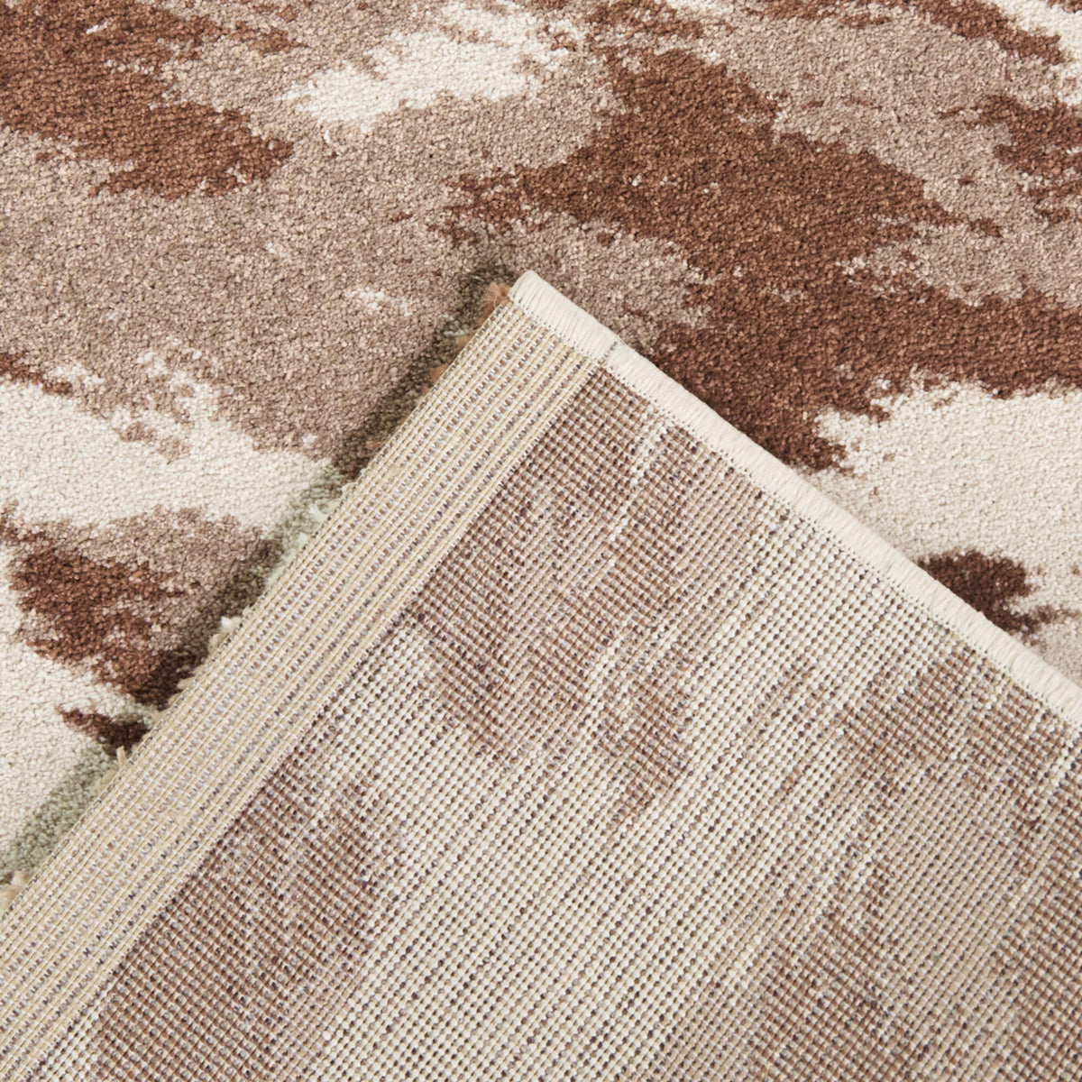 Sanchez Cow Print Area Rug