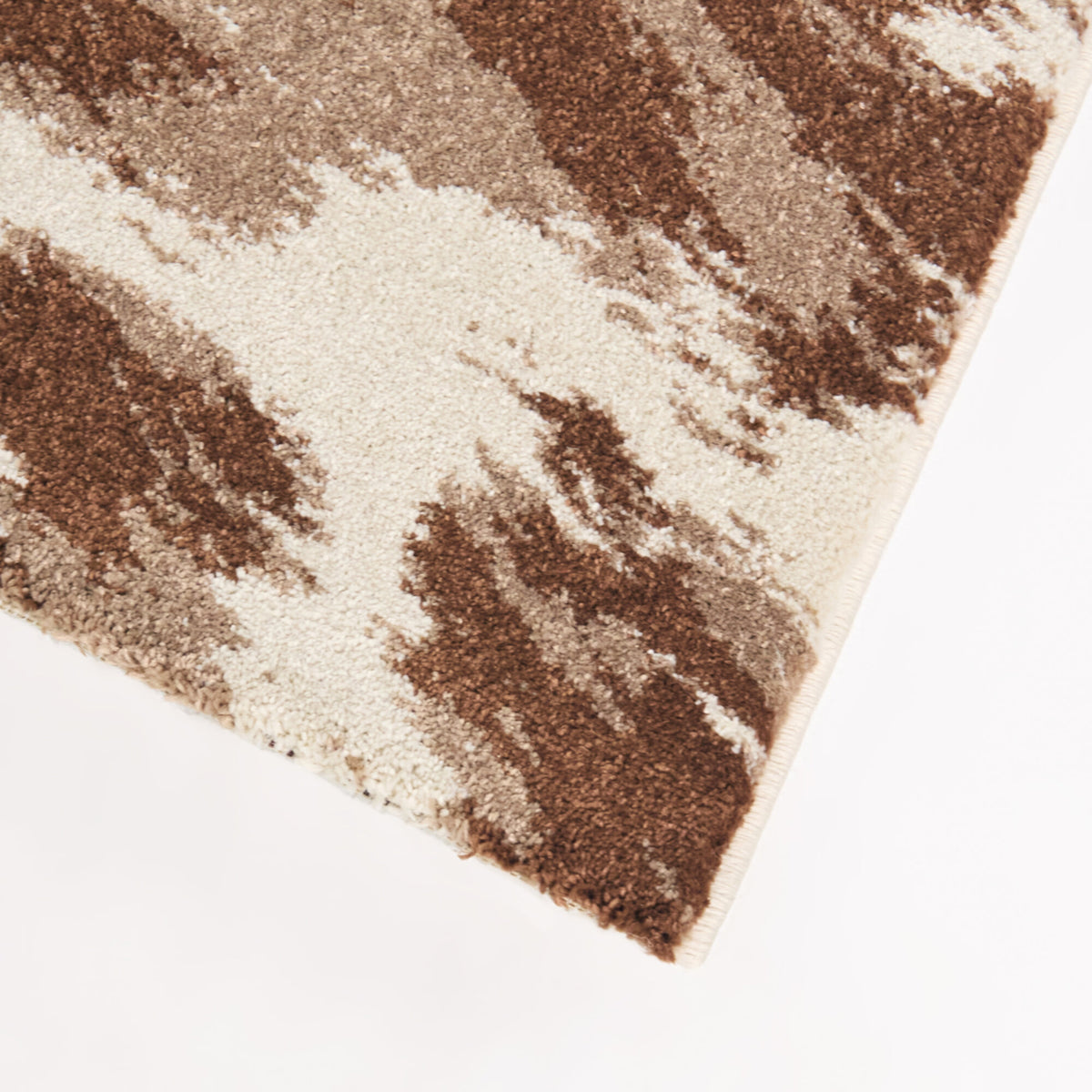Sanchez Cow Print Area Rug