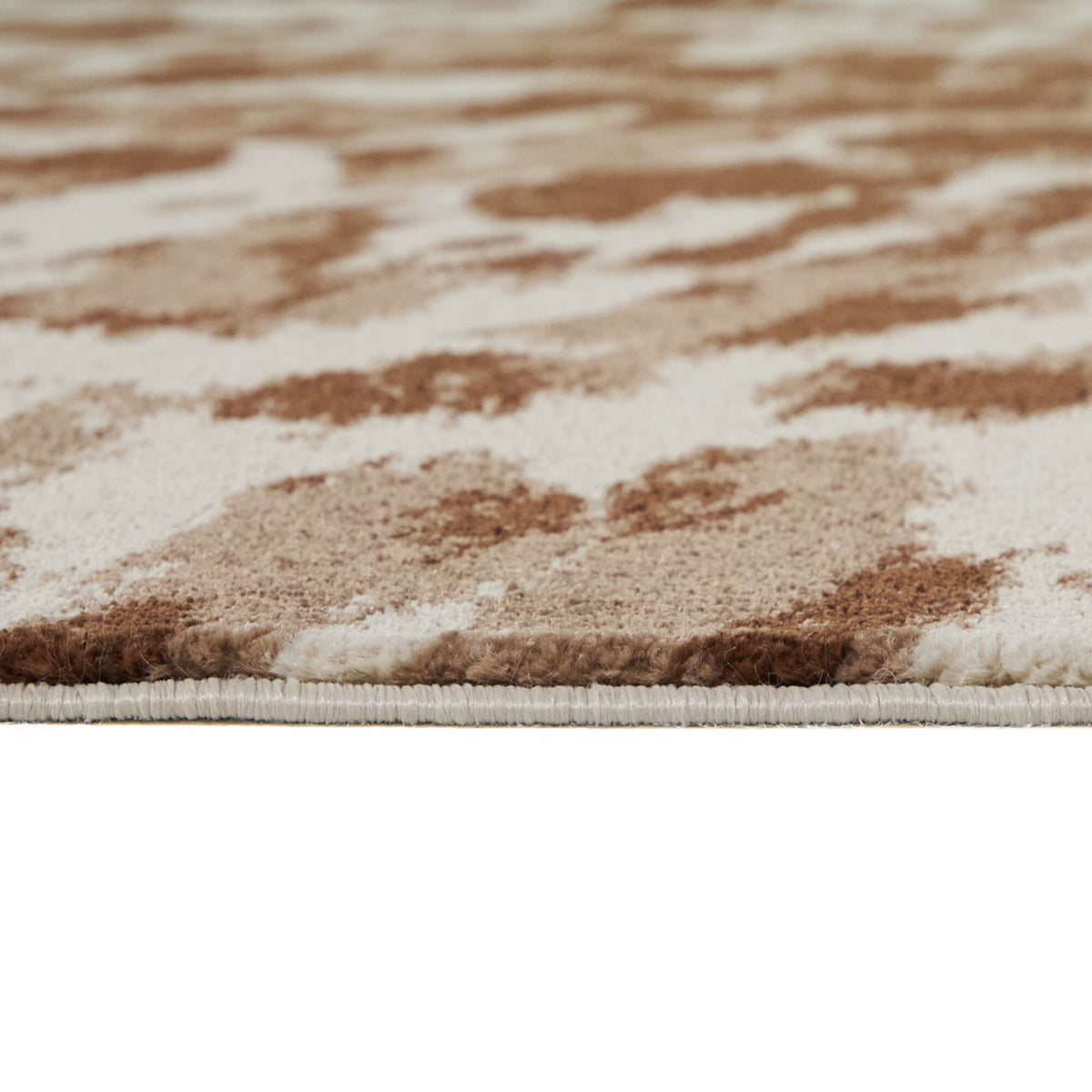 Sanchez Cow Print Area Rug