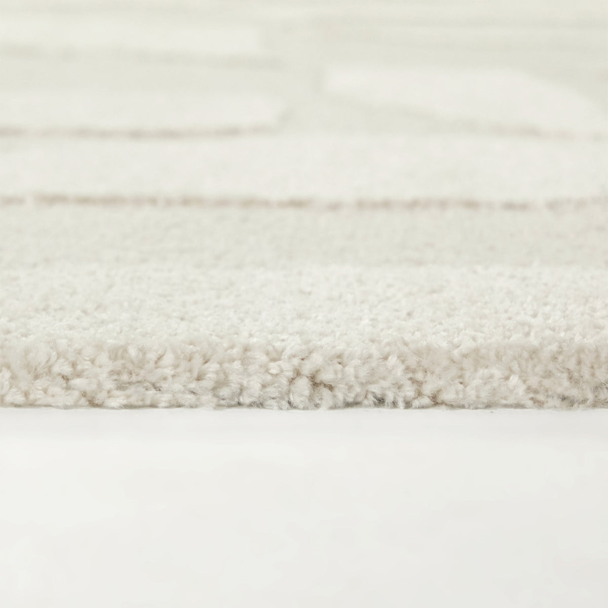 Isidore Abstract Textured  Area Rug