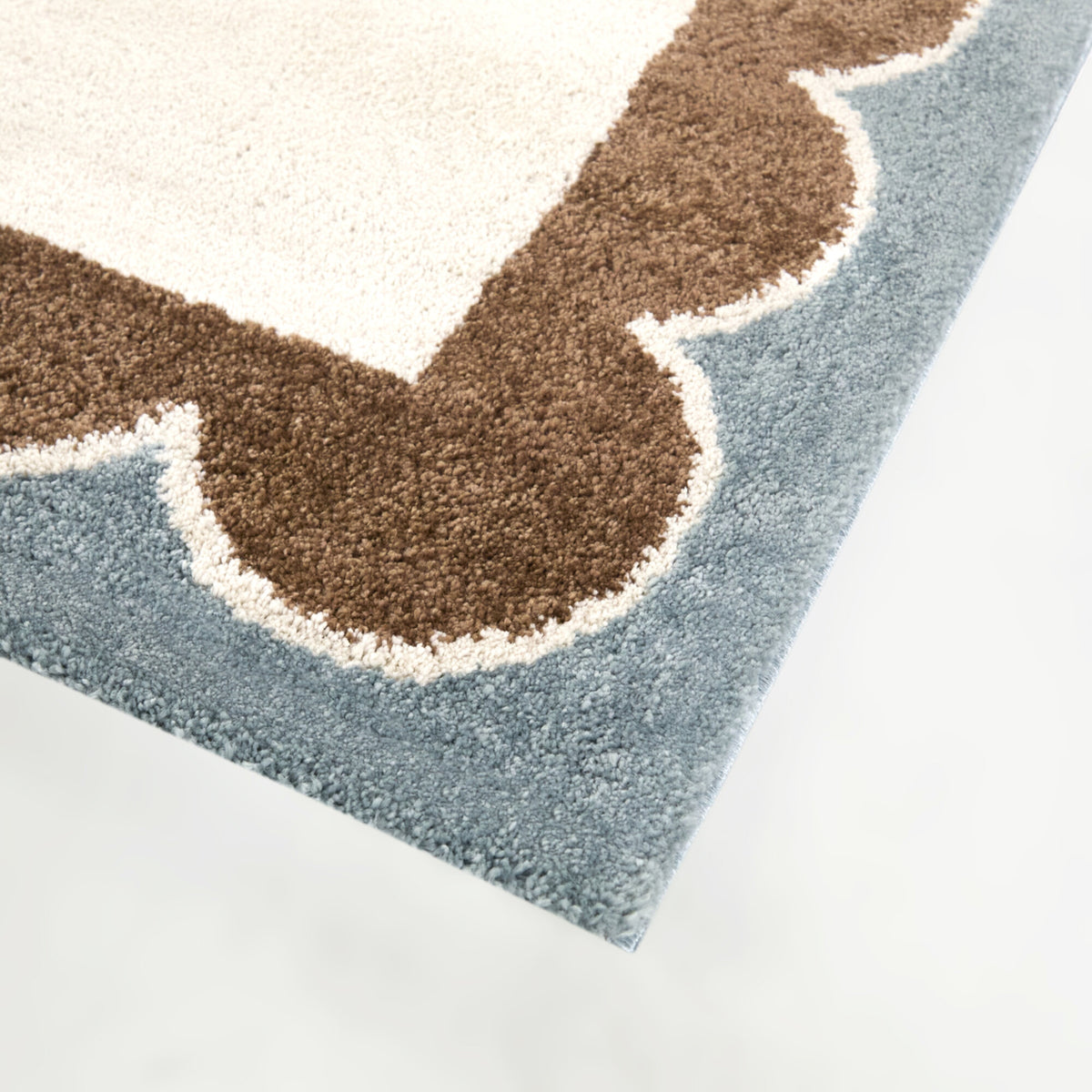 Caldeira Scalloped Border  Area Rug