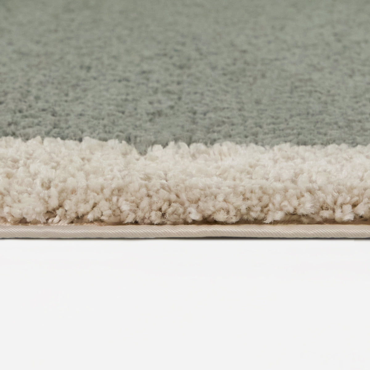 Odelle Solid Border Area Rug