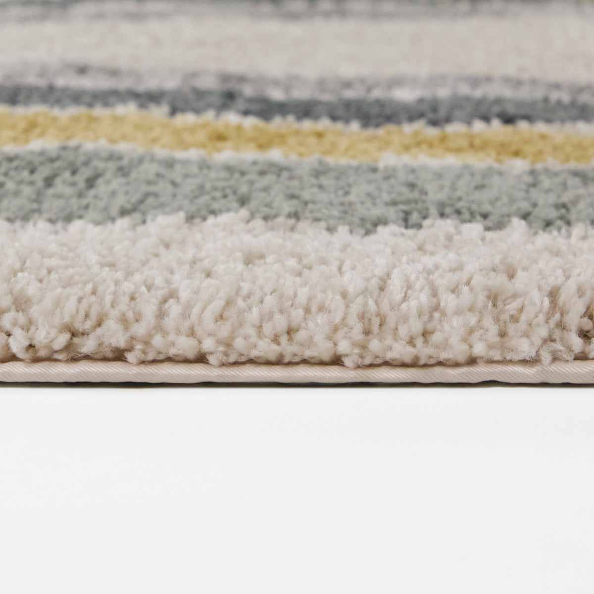 Ignaz Solid Striped Border Area Rug