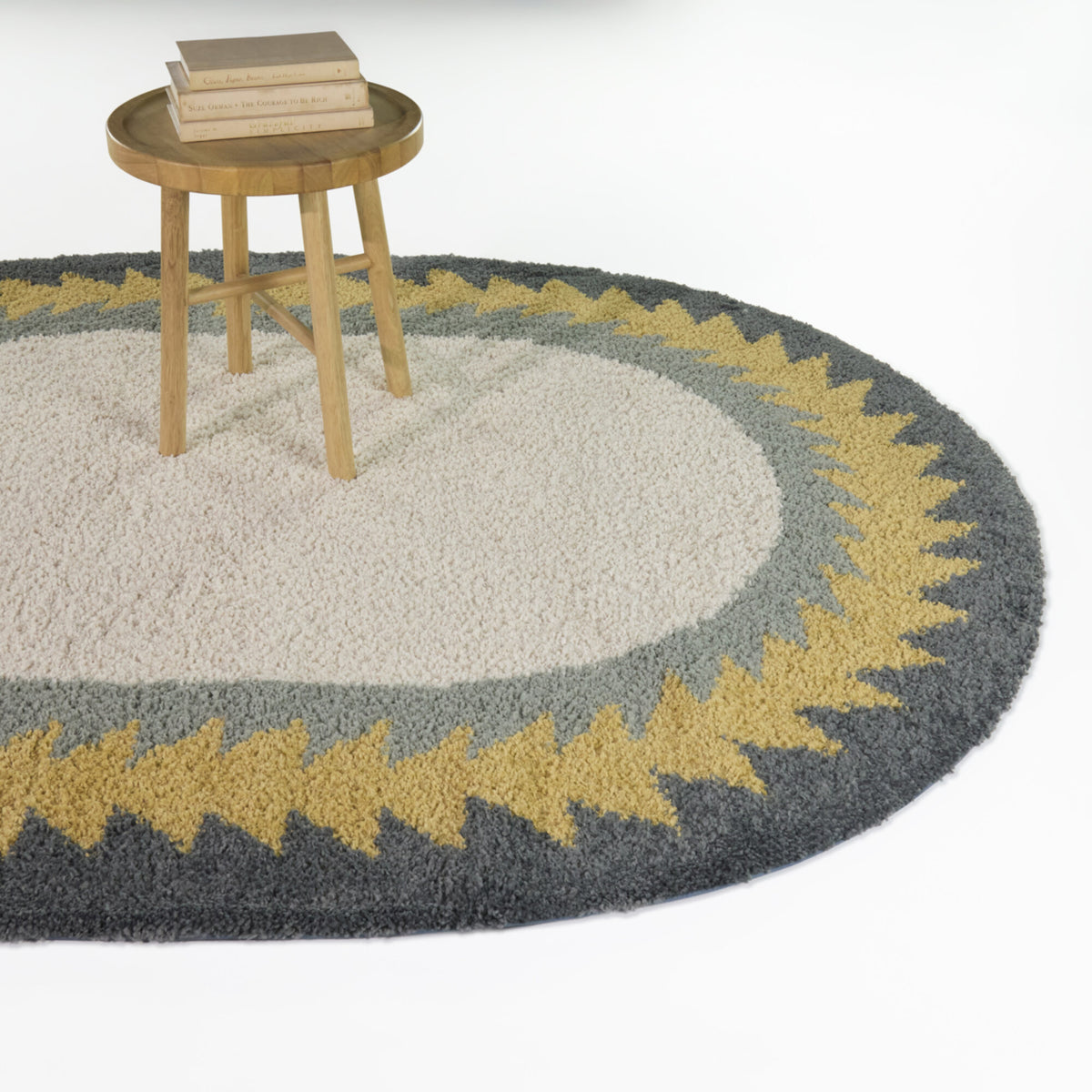 Kinnaird Triangular Border Area Rug