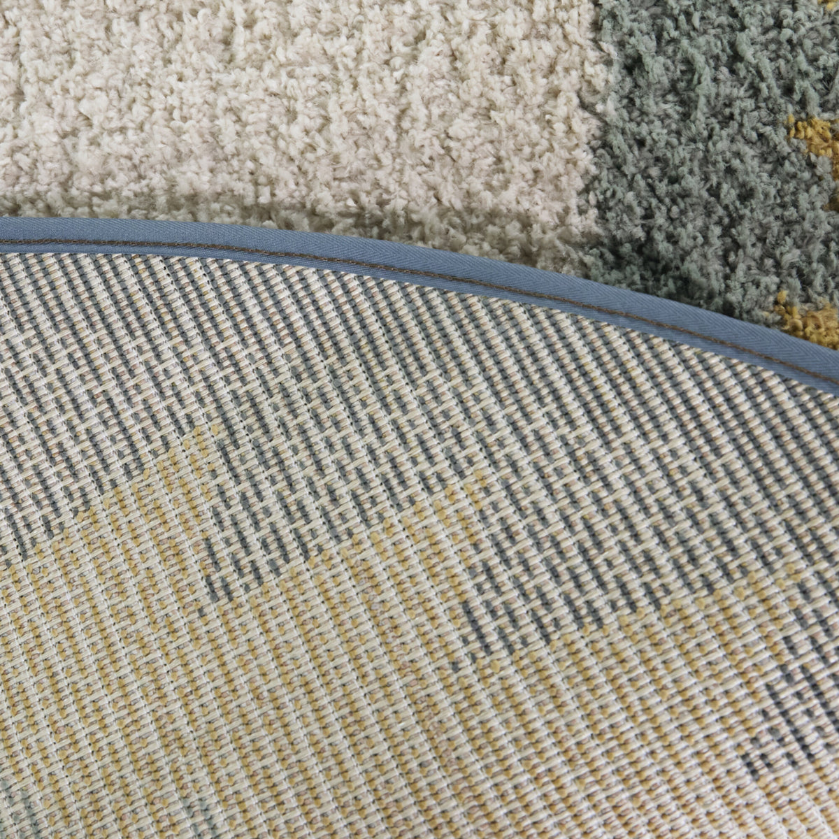 Kinnaird Triangular Border Area Rug