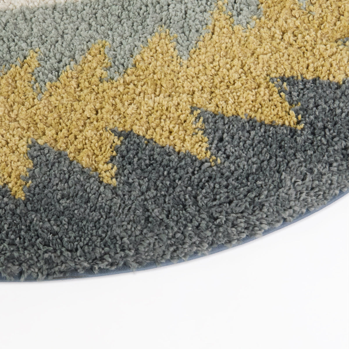 Kinnaird Triangular Border Area Rug