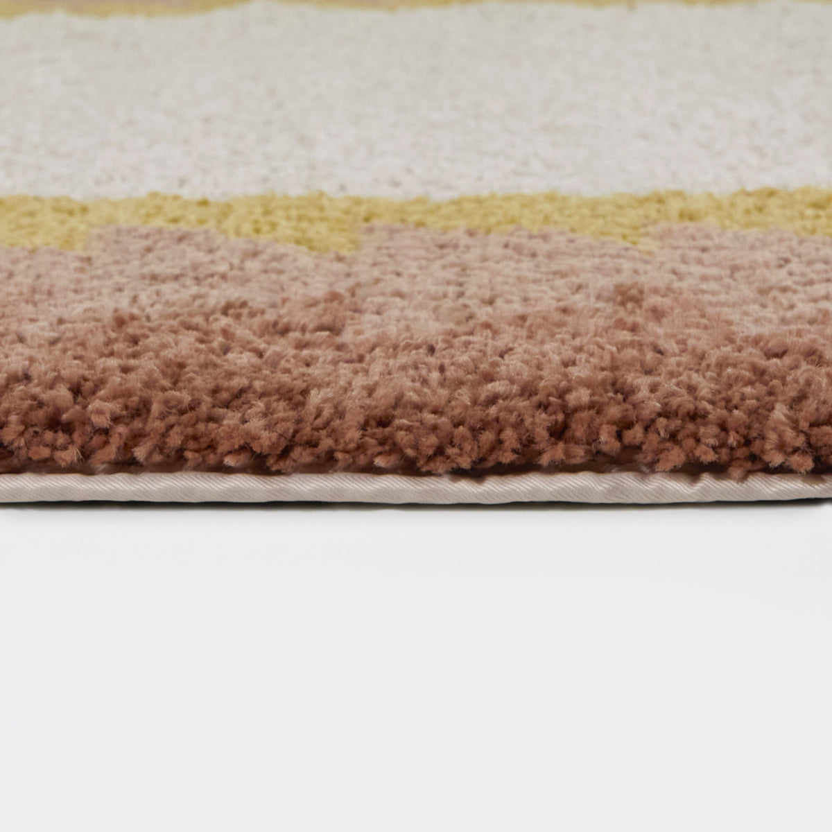 Kinnaird Triangular Border Area Rug