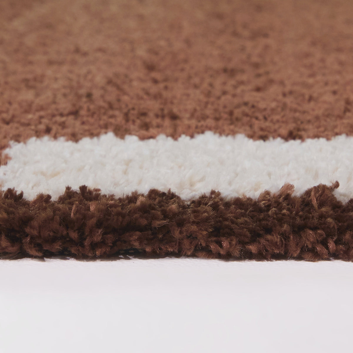 Rohan Geometric Border Area Rug